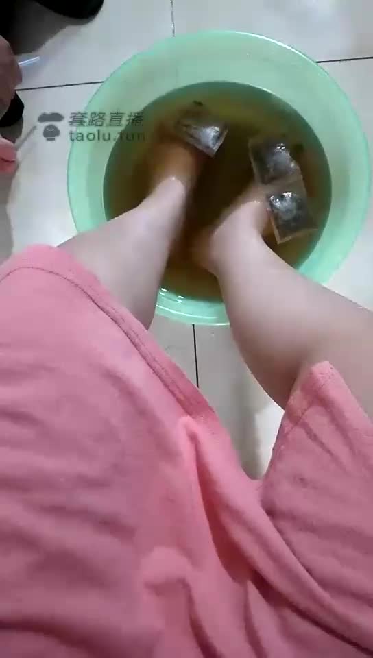 Two foot slaves drinking foot wash