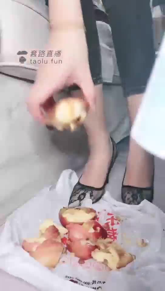 High heels stepping on an apple humiliated licking
