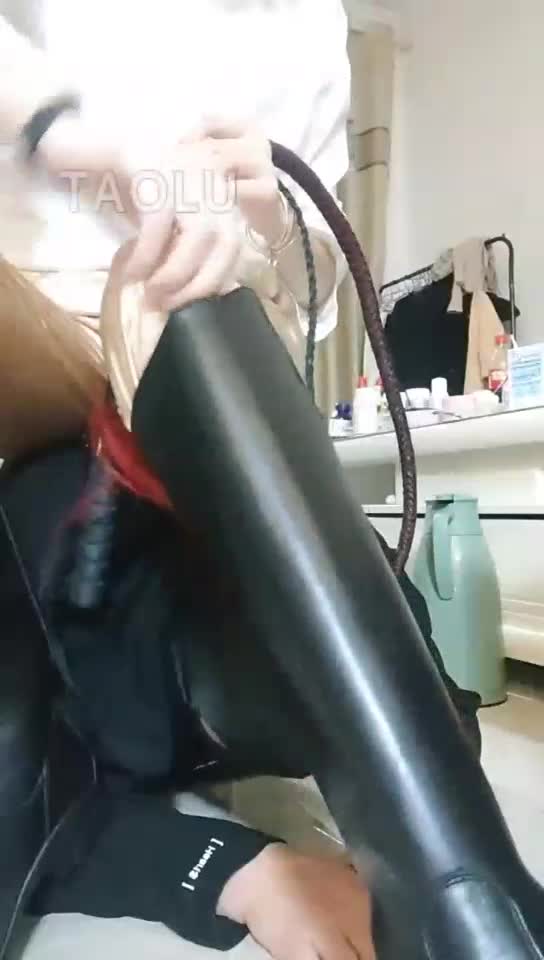 Boots trampling and licking feet