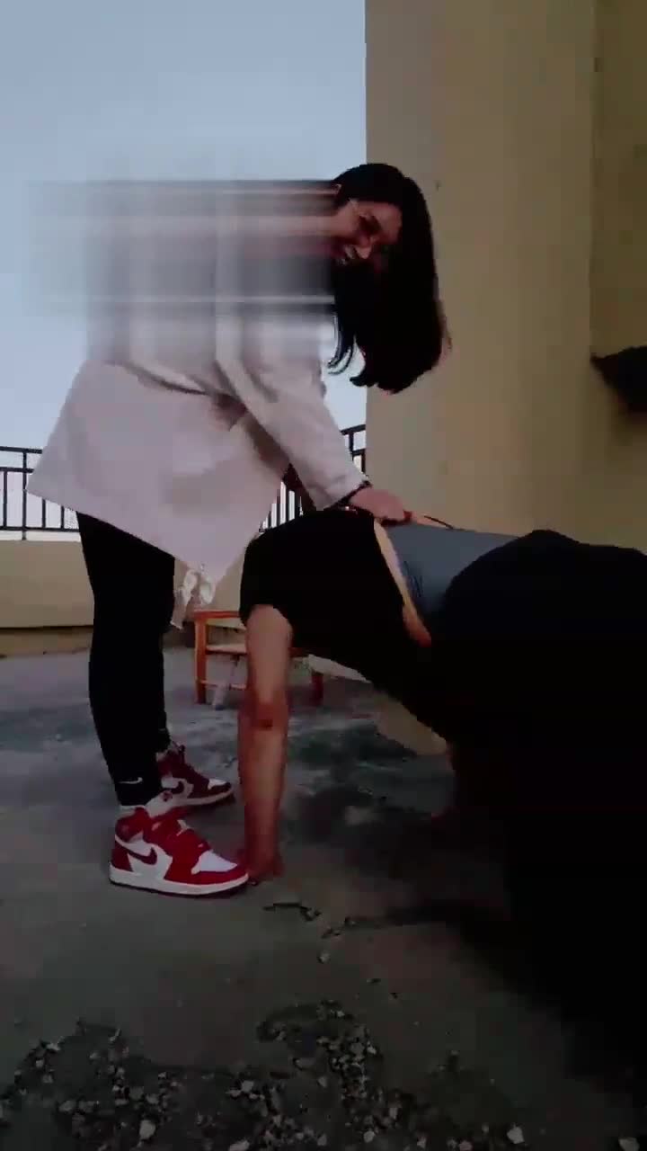 Rooftop dog abuse, kicking, trampling, cleaning the soles