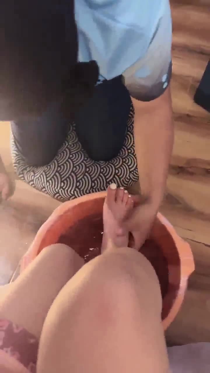 Foot slave in front of an amateur pedicurist