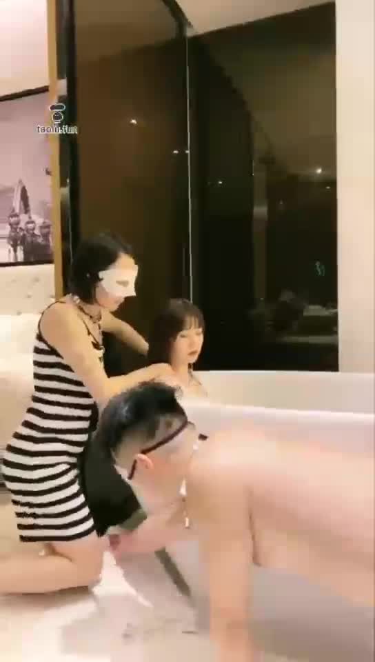 Couple slave bathtub serving extreme temptation